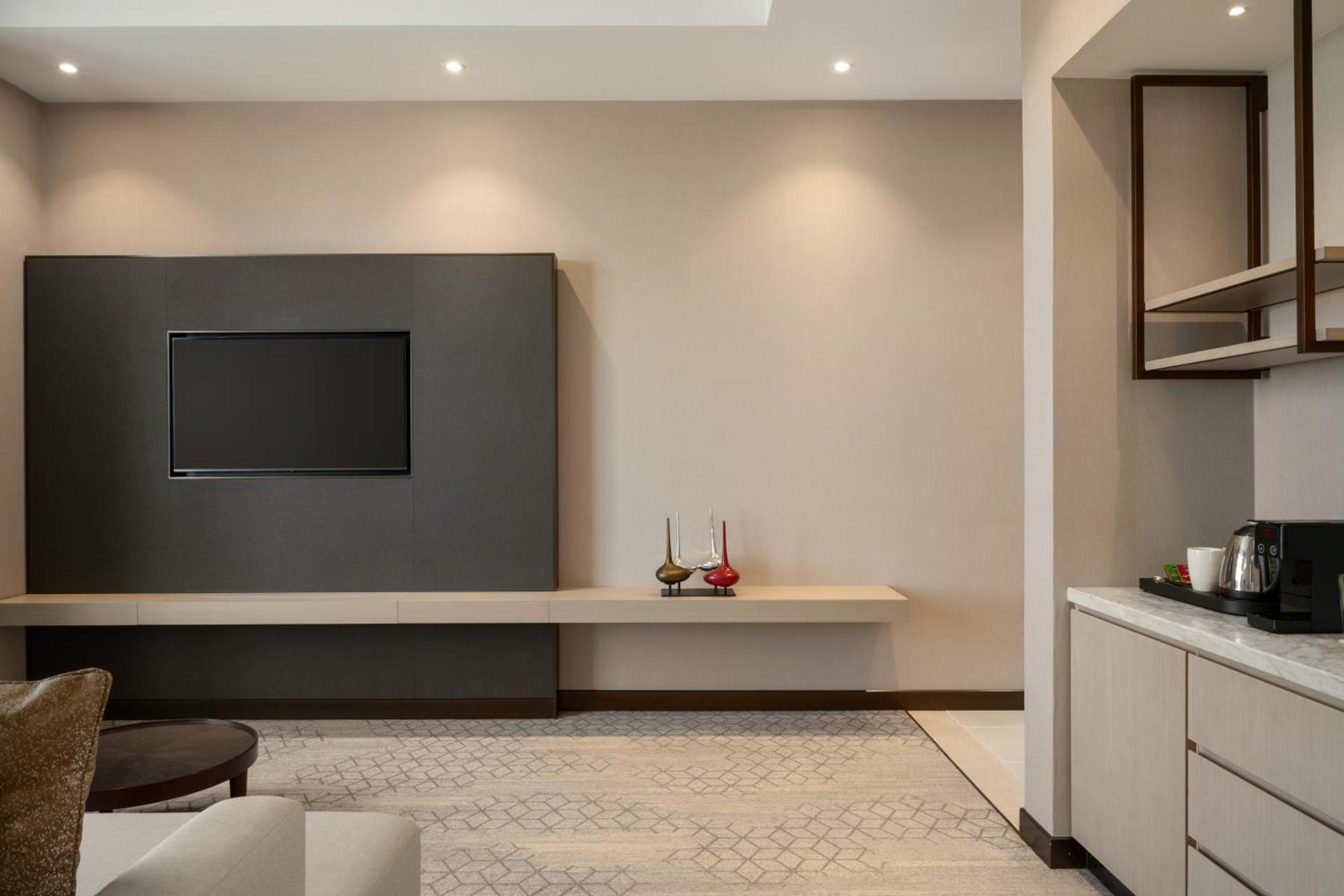 Ramada By Wyndham Riyadh King Fahd Road Exterior photo A living room at the hotel